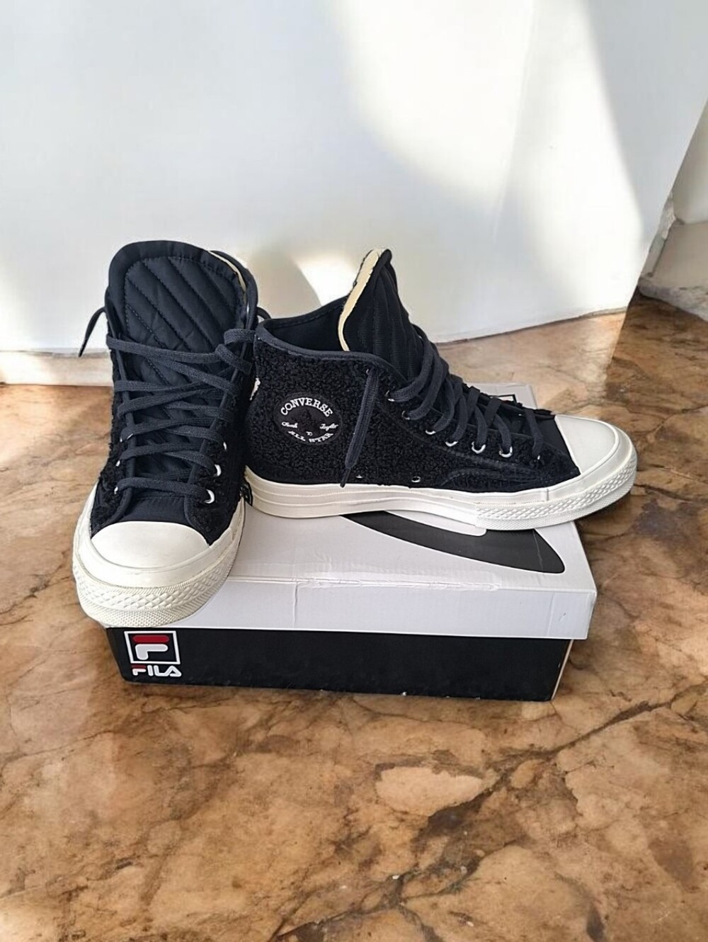 Converse High Top Sneakers in Black and WhiteConverse Chuck 70 Sherpa Cozy Lace